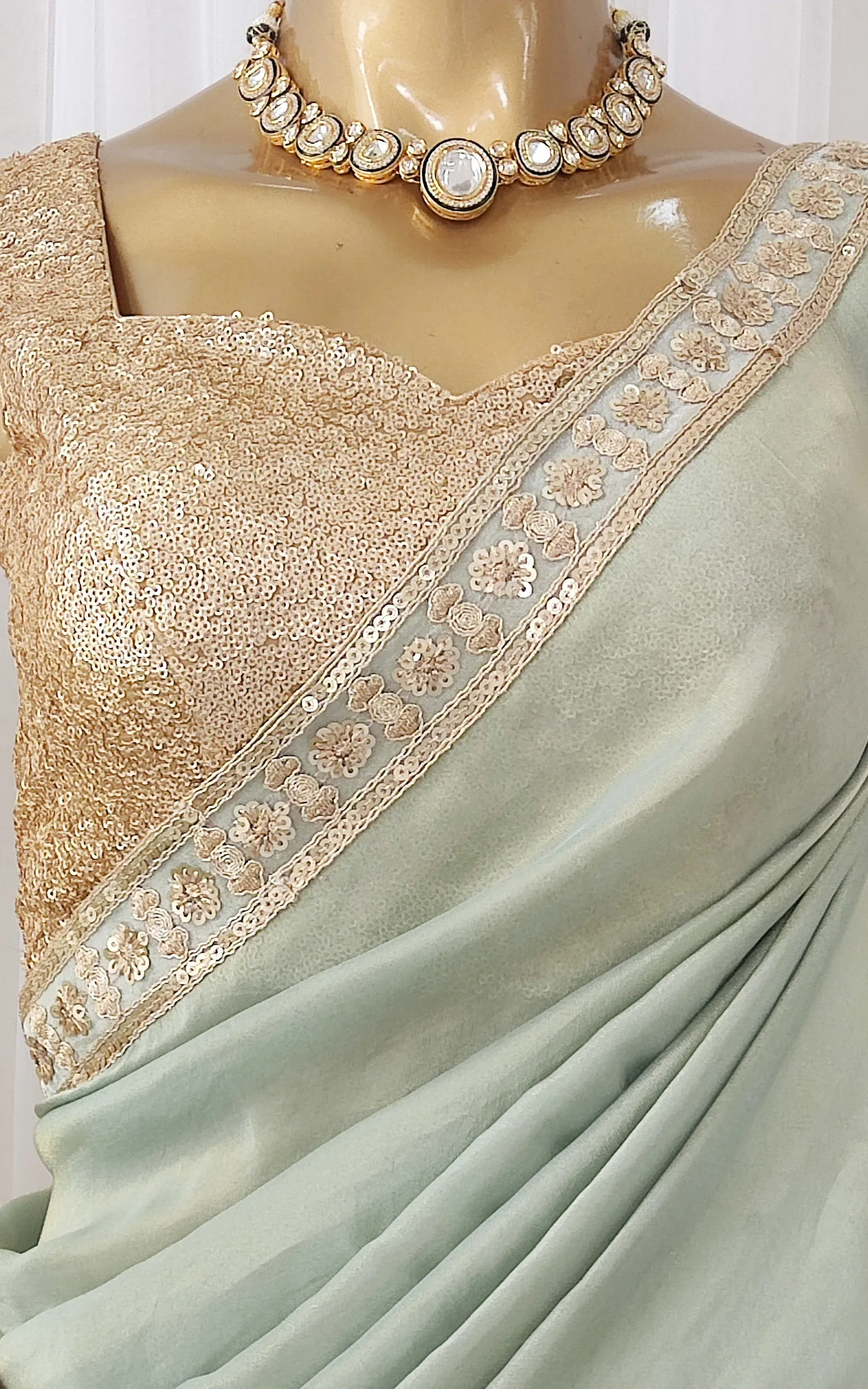 Seafoam Green Tissue Georgette Saree with Gold Sequinned Blouse