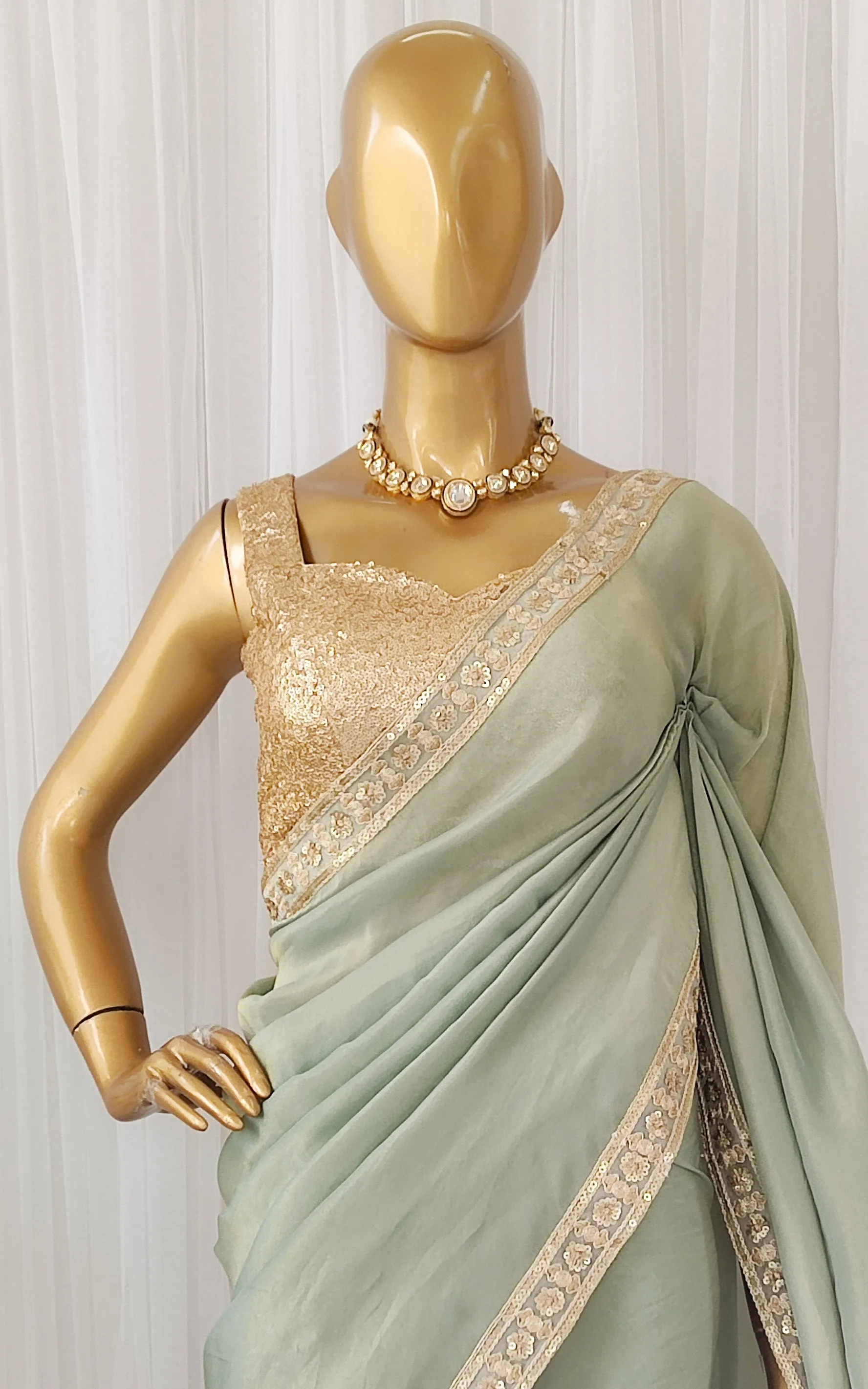 Seafoam Green Tissue Georgette Saree with Gold Sequinned Blouse