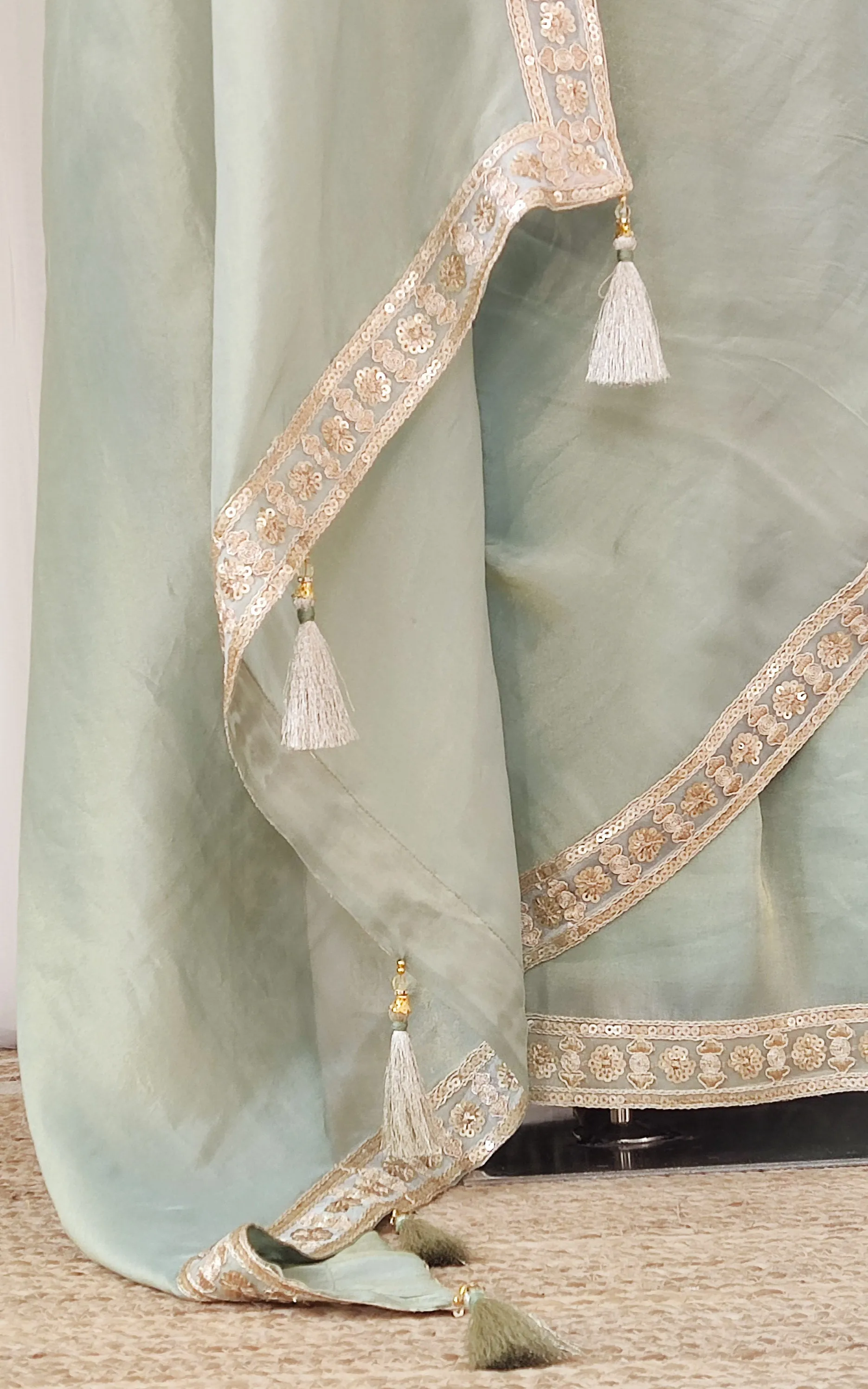 Seafoam Green Tissue Georgette Saree with Gold Sequinned Blouse