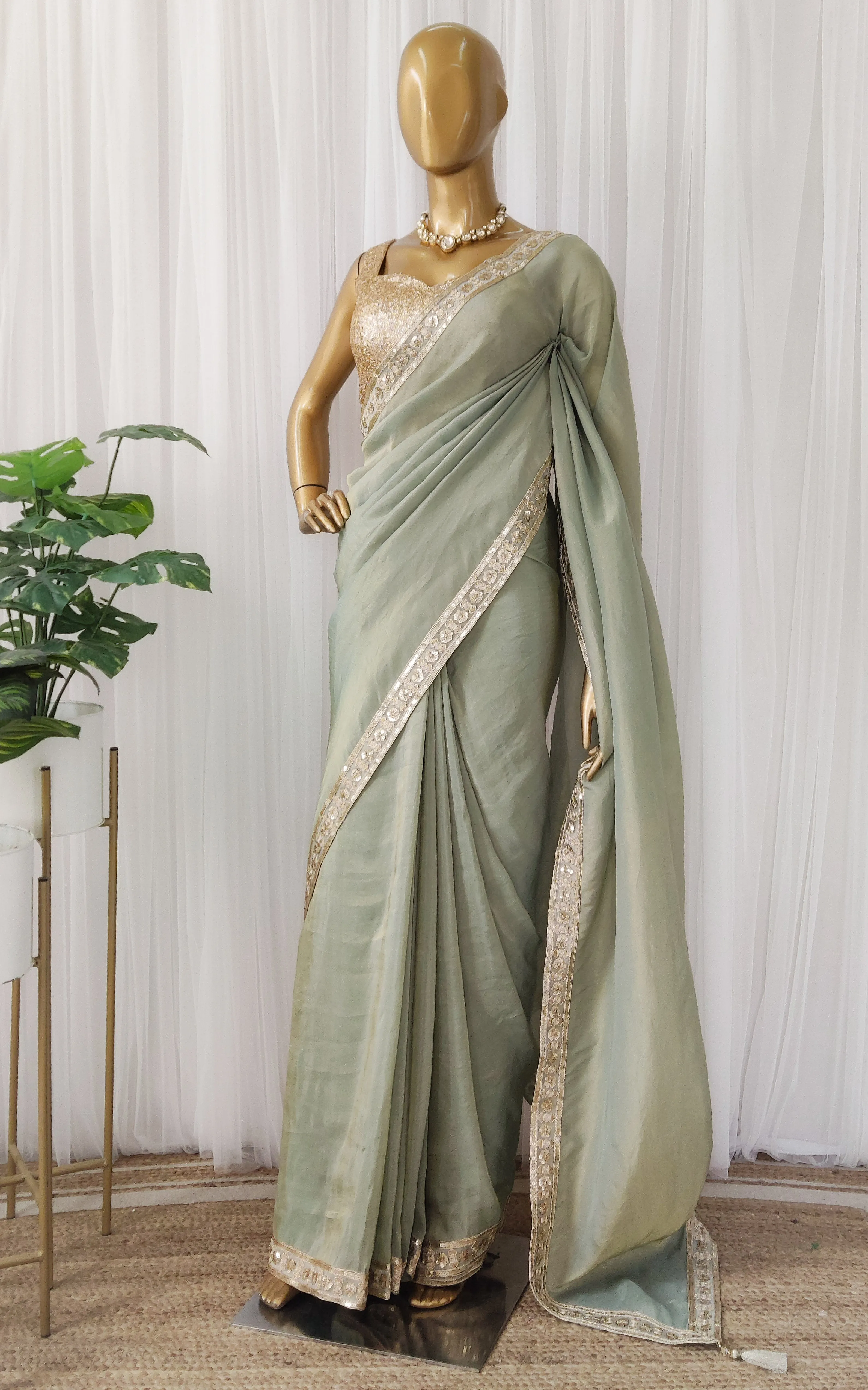 Seafoam Green Tissue Georgette Saree with Gold Sequinned Blouse