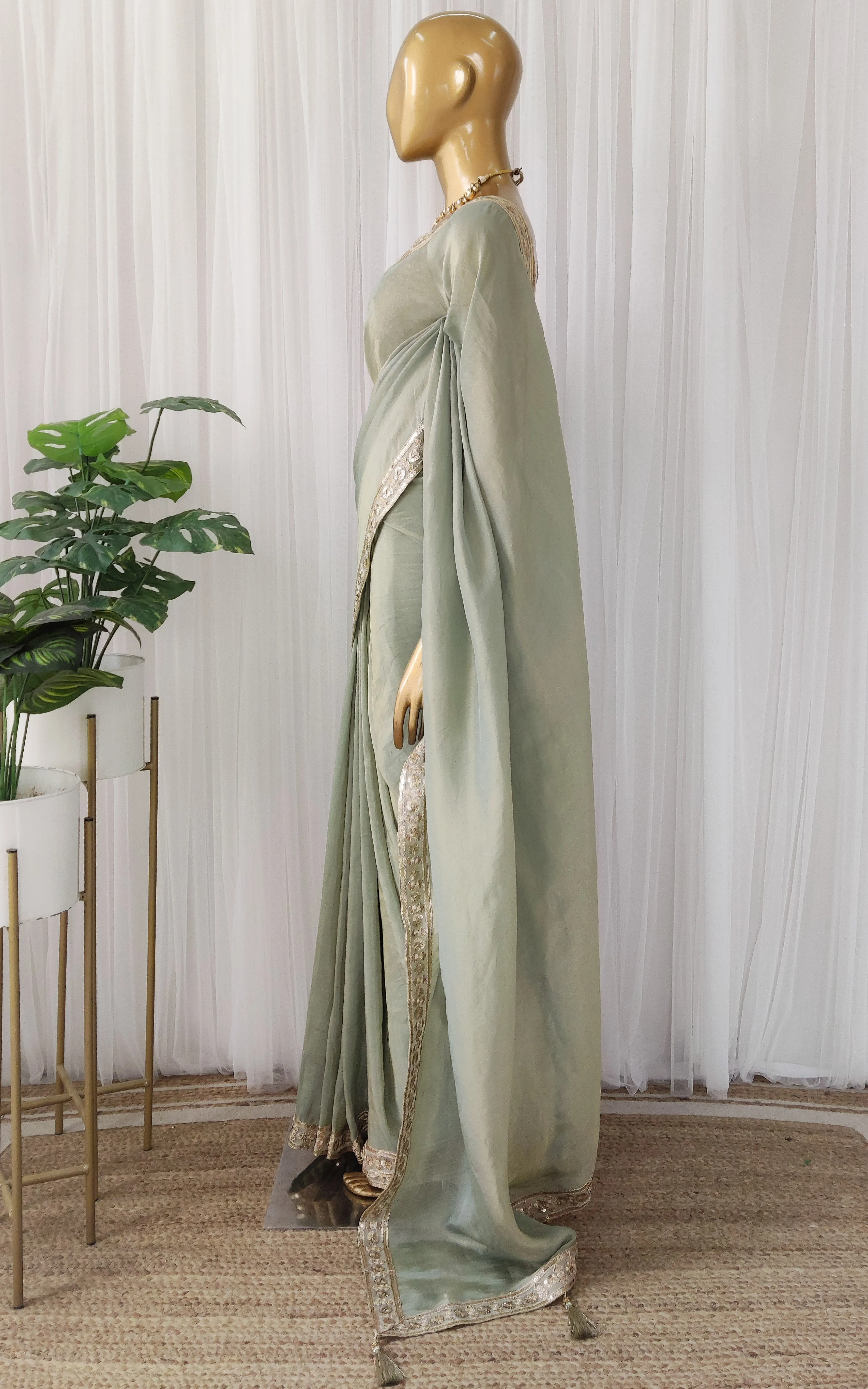 Seafoam Green Tissue Georgette Saree with Gold Sequinned Blouse