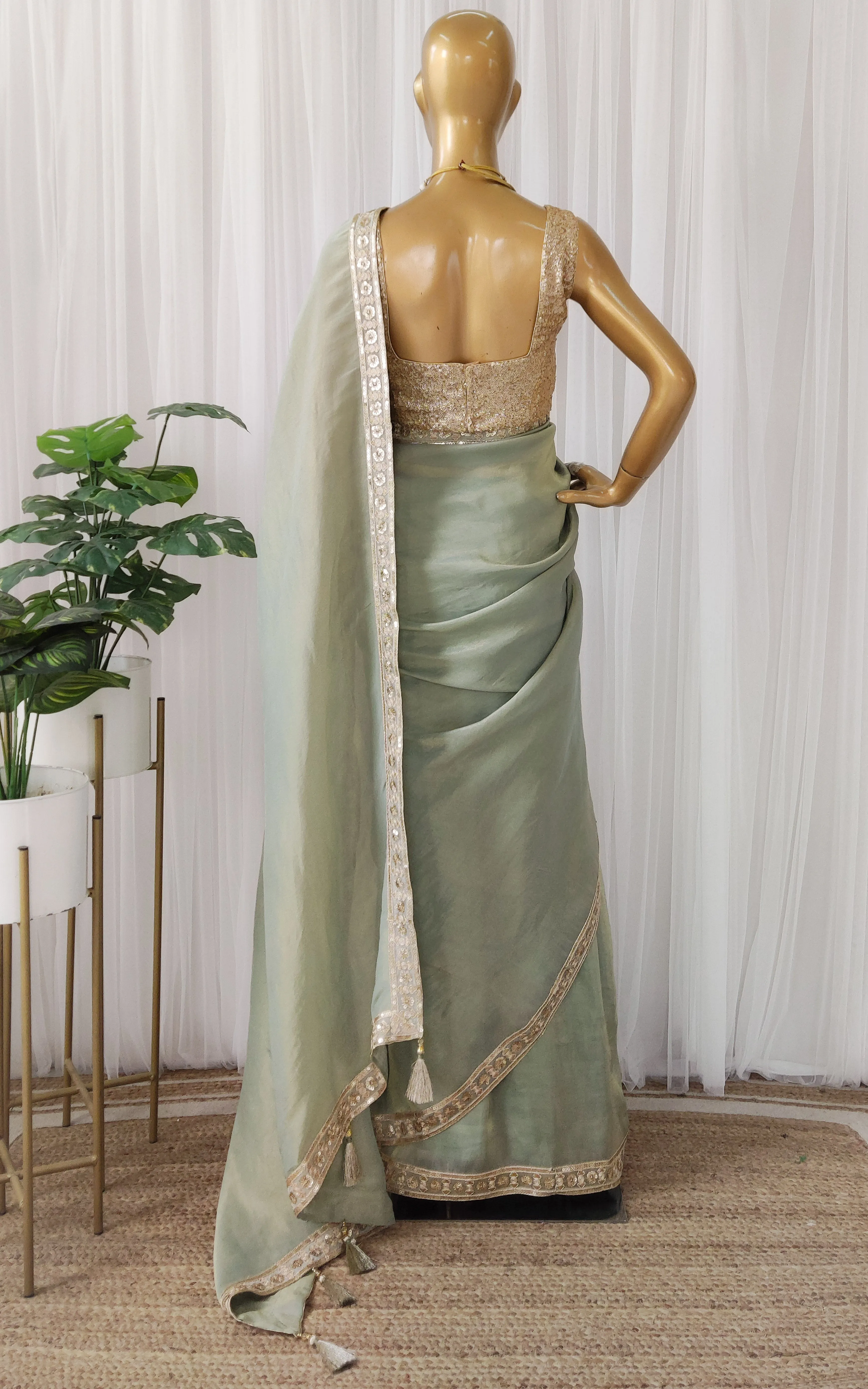 Seafoam Green Tissue Georgette Saree with Gold Sequinned Blouse